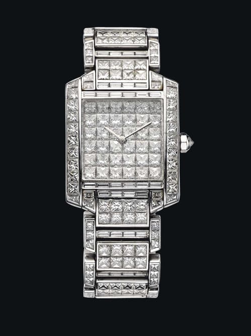 Montre Tank Française de Cartier, mouvement quartz, pavage diamants carrés. Estimation: 46 000 - 55 000 euros.